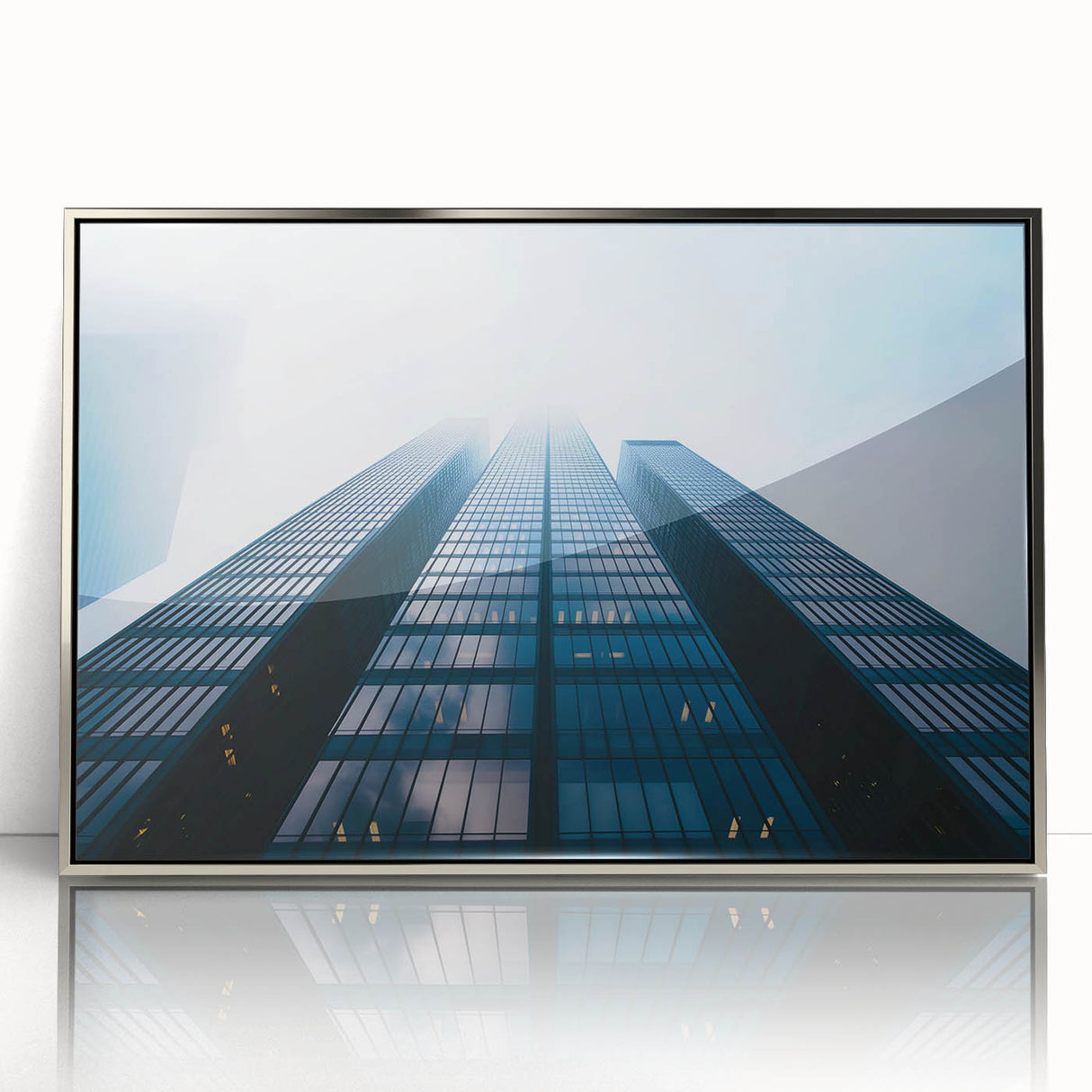 Art deco style skyscraper design in silver and gray tones on a framed acrylic, ideal for modern art wall decor.