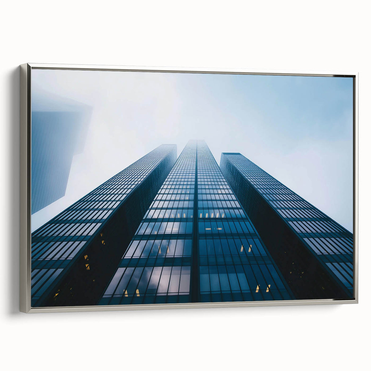 Vintage poster art of a skyscraper, in black and colorful tones on a framed canvas, ideal for living room decor.