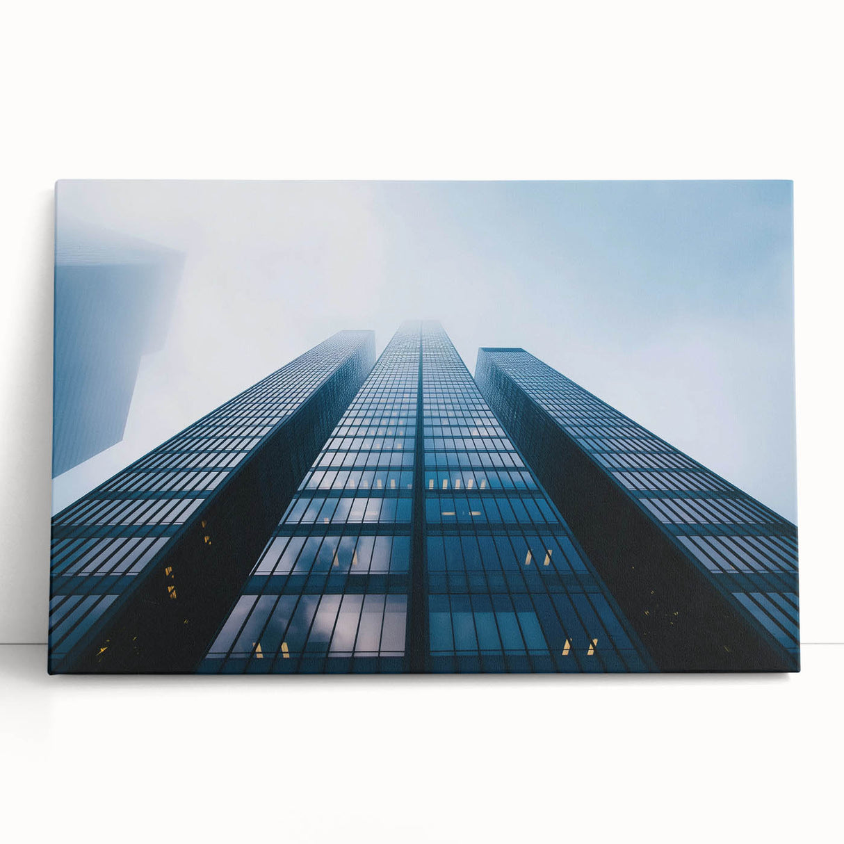 Large black and white photo of skyscrapers on stretched canvas, suitable as kitchen wall art or for a bedroom.