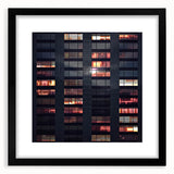 Extra large abstract art print featuring colorful, textured skyscraper designs on a black framed canvas.