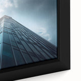Extra large framed canvas featuring a close-up of a black skyscraper with colorful, textured accents.