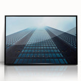 Large abstract wall art of skyscrapers in muted gray tones, framed in black acrylic, suitable for modern office decor.