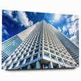 Acrylic print of a large abstract skyscraper design in cool blue and gray tones.
