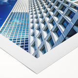Art deco poster of a skyscraper in monochrome, printed on rolled canvas, suitable for dining room wall art.