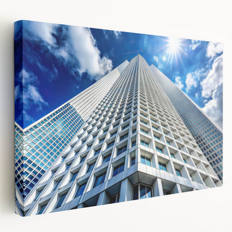 Large art print of a modern skyscraper in gray tones on stretched canvas, suitable for kitchen wall art.