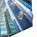 Large abstract wall art featuring a mid-century modernist skyscraper design in muted gray tones on acrylic glass.