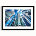 Extra large abstract art print featuring colorful, textured skyscraper designs on a framed black mat.