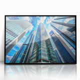 Large abstract wall art of a skyscraper, in muted gray tones on framed acrylic, ideal for modern office decor.