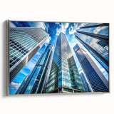 Vintage poster art of a skyscraper, rendered in black with colorful accents on a silver-framed canvas.