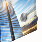 Mid-century modernist large abstract wall art featuring a skyscraper design in muted grays on acrylic glass.