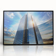 Large abstract wall art featuring geometric skyscraper designs in black and gray tones on a framed acrylic.