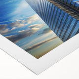 Art deco poster featuring a geometric skyscraper design in monochrome shades on rolled canvas.