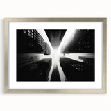 Abstract art print of a skyscraper in silver and gray tones on a framed canvas, suitable for dining room decor.