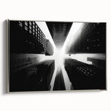 Vintage poster art of skyscrapers in silver frame, featuring black and colorful elements, suited for large living room walls.