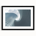 Abstract art print of skyscrapers in vibrant colors on a large textured canvas, suitable for living room decor.