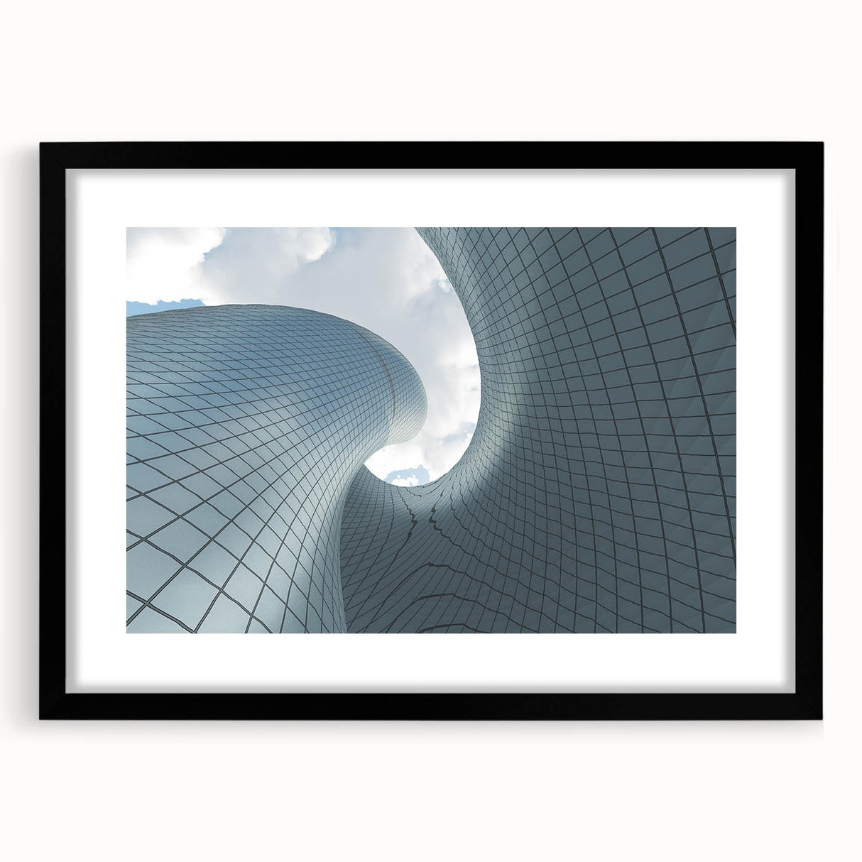 Abstract art print of skyscrapers in vibrant colors on a large textured canvas, suitable for living room decor.