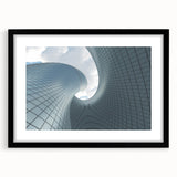 Abstract art print of skyscrapers in vibrant colors on a large textured canvas, suitable for living room decor.