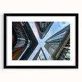 Extra large abstract art print featuring colorful, textured skyscraper design on a black framed canvas.