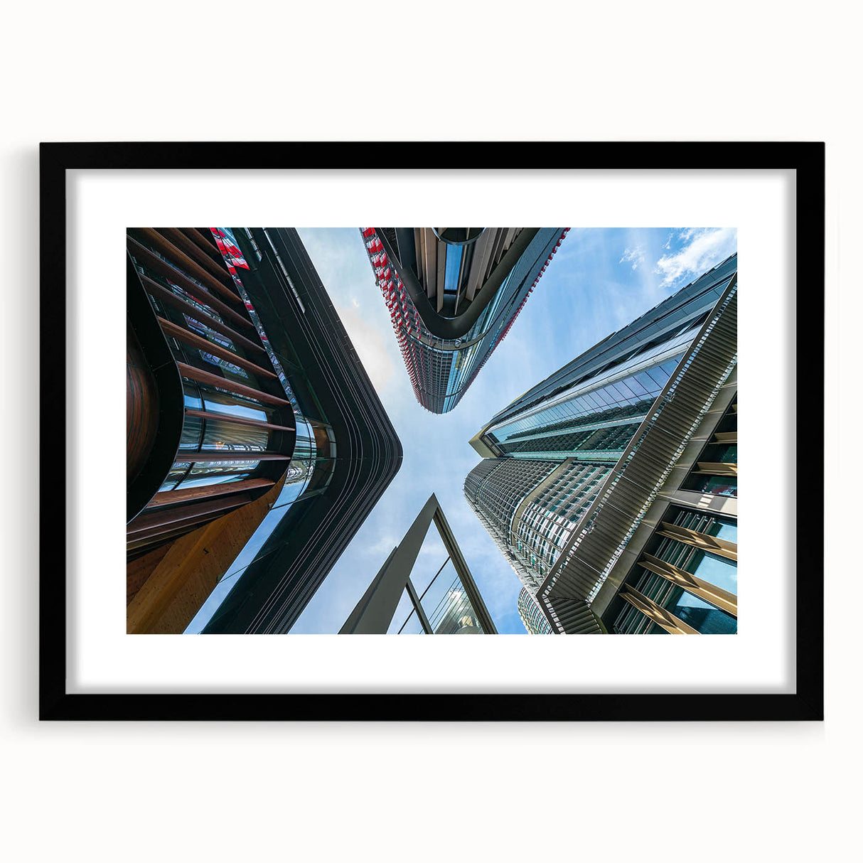 Extra large abstract art print featuring colorful, textured skyscraper design on a black framed canvas.