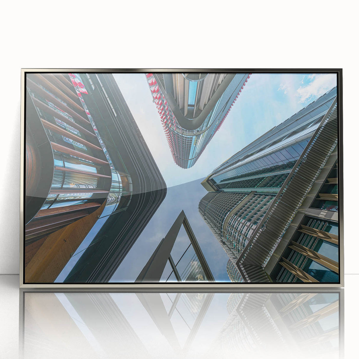 Art deco style skyscraper design on a framed acrylic print, featuring silver and gray tones.