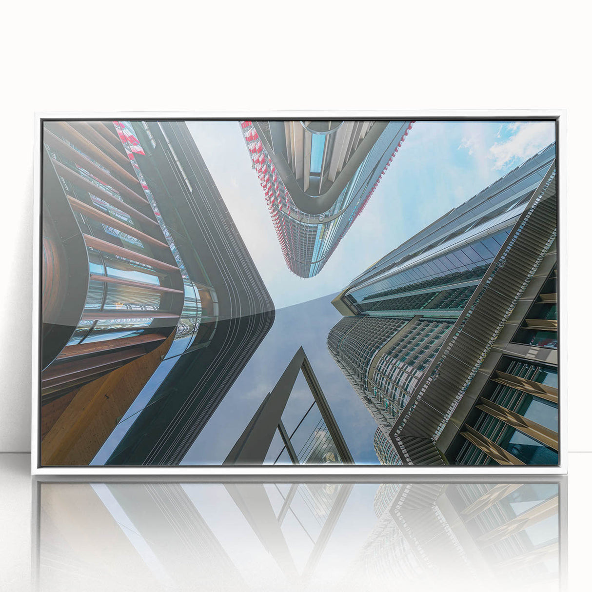 Large art print of a mid-century modernist skyscraper design in black and white on framed acrylic.