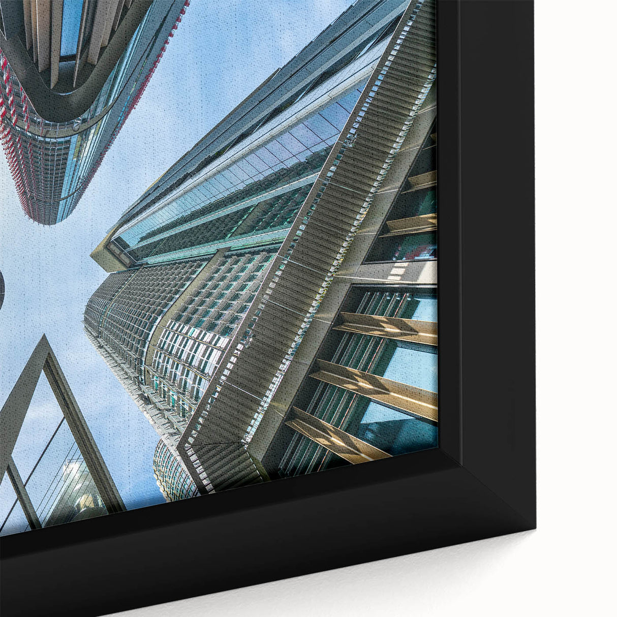 Extra large framed canvas featuring a close-up of a black skyscraper with colorful, textured details.