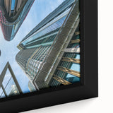 Extra large framed canvas featuring a close-up of a black skyscraper with colorful, textured details.