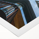 Art deco poster of a skyscraper, in muted metallic tones on rolled canvas, suited for dining room walls.