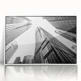 Mid-century modernist skyscraper design in black and gray on a white acrylic framed print.