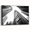 Black and white framed canvas of skyscraper architecture, ideal for bedroom wall art in a vintage poster style.
