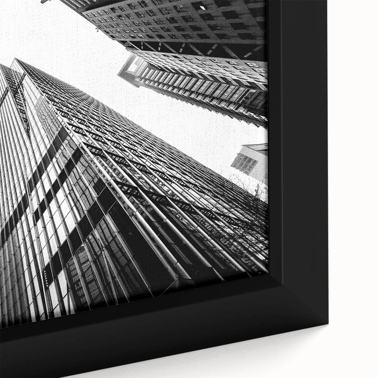 Extra large black wall art featuring a textured skyscraper design in colorful hues on framed canvas.