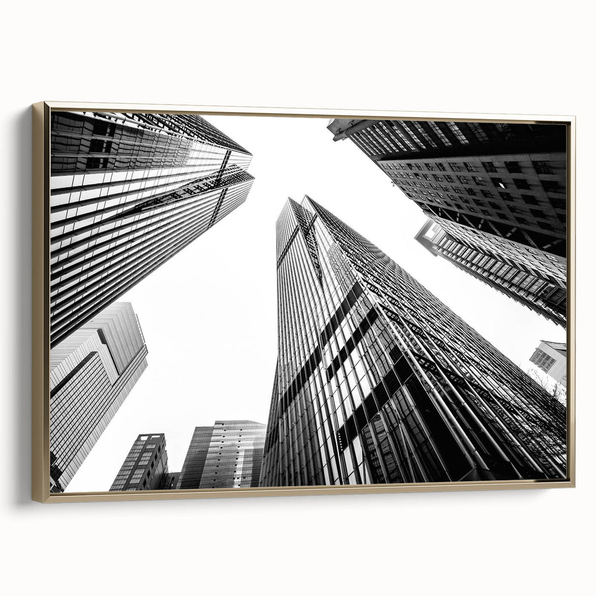 Framed canvas featuring a vintage-style landscape painting of skyscrapers.