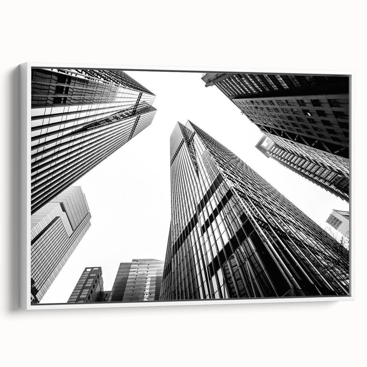 Framed canvas of a black and white vintage skyscraper design, ideal for bedroom wall art.