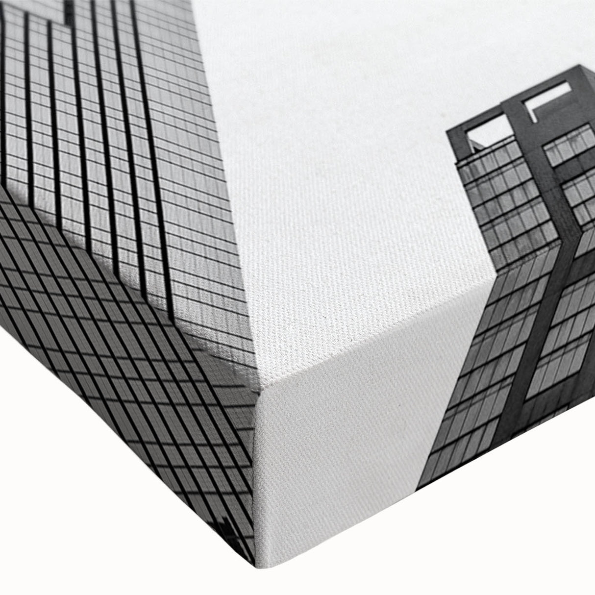 Black and white photo of skyscrapers on stretched canvas, ideal for modern bedroom wall art.