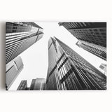 Black and white photo of a skyscraper on stretched canvas, ideal for kitchen wall art.