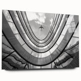 Large abstract wall art of a skyscraper design in muted gray tones on acrylic glass.