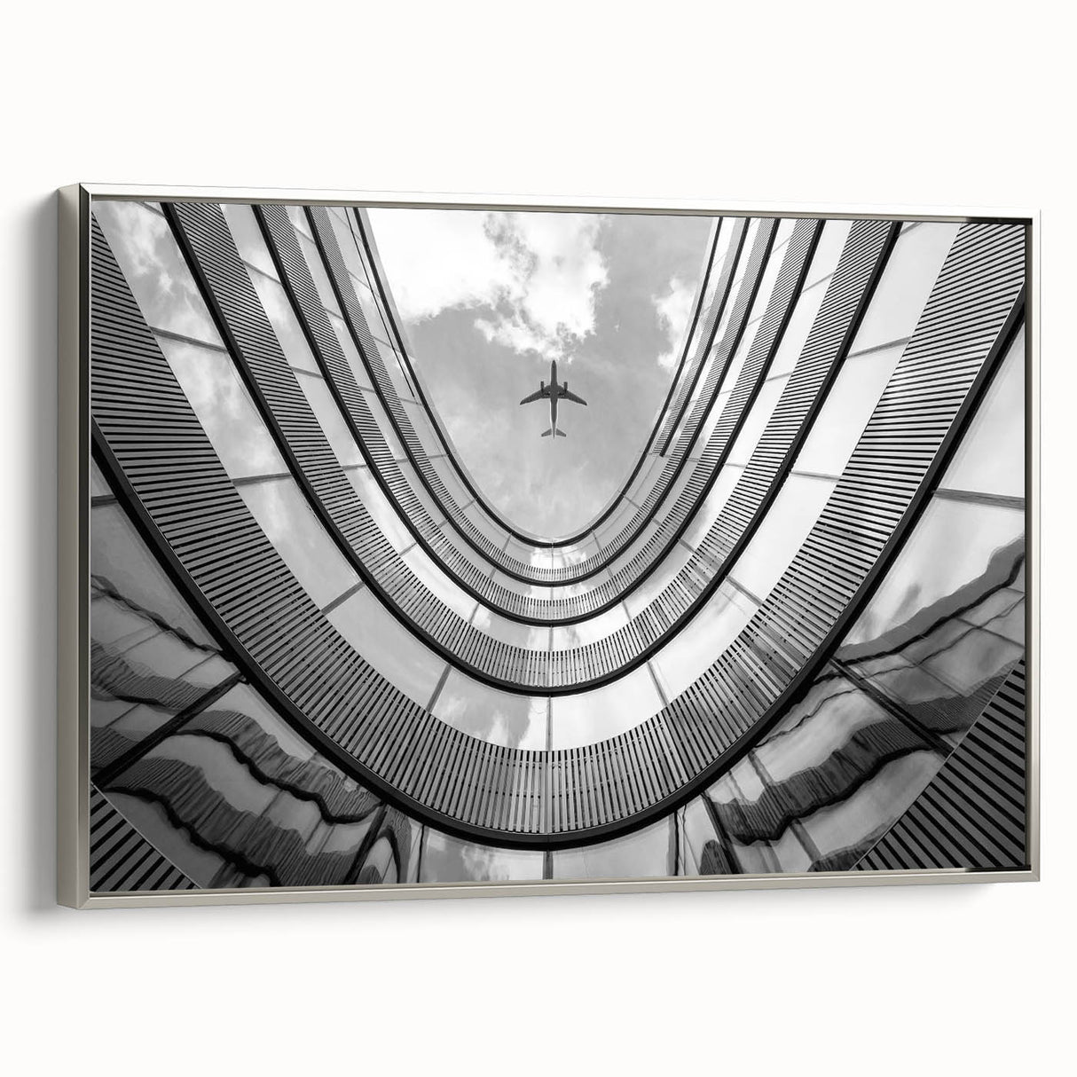 Vintage poster art of a skyscraper rendered in a black and colorful palette on extra large framed canvas.