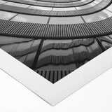 Art deco poster featuring a geometric skyscraper design in monochrome, printed on rolled canvas.