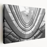 Large art print of a modern skyscraper in gray tones on stretched canvas, suitable for kitchen wall decor.
