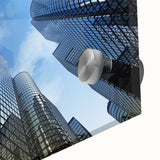 Mid-century modernist skyscraper design in muted gray tones on large acrylic glass, ideal for dining room art.