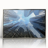 Art Deco style poster of skyscrapers in silver framed acrylic, featuring cool gray tones, ideal for modern art wall decor.