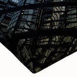 Large art of a black and white skyscraper landscape on stretched canvas, suitable for bedroom wall decor.