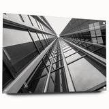 Acrylic glass print of abstract skyscraper design in gray and blue tones, ideal for modern dining room decor.