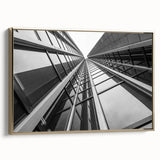 Framed canvas featuring a vintage-style landscape art painting of skyscrapers in gold and black tones.