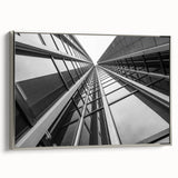 Vintage poster art of skyscrapers in colorful art style, framed in silver, ideal for living room decor.