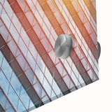 Mid-century modernist large abstract wall art on acrylic, featuring a skyscraper design in muted grays.