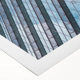 Art deco poster of towering skyscrapers in muted metallic tones on rolled canvas, suitable for dining room wall art.