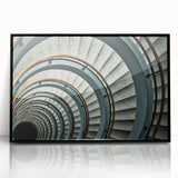 Large abstract wall art of a spiral staircase in black and white, framed acrylic, ideal for modern art wall decor.