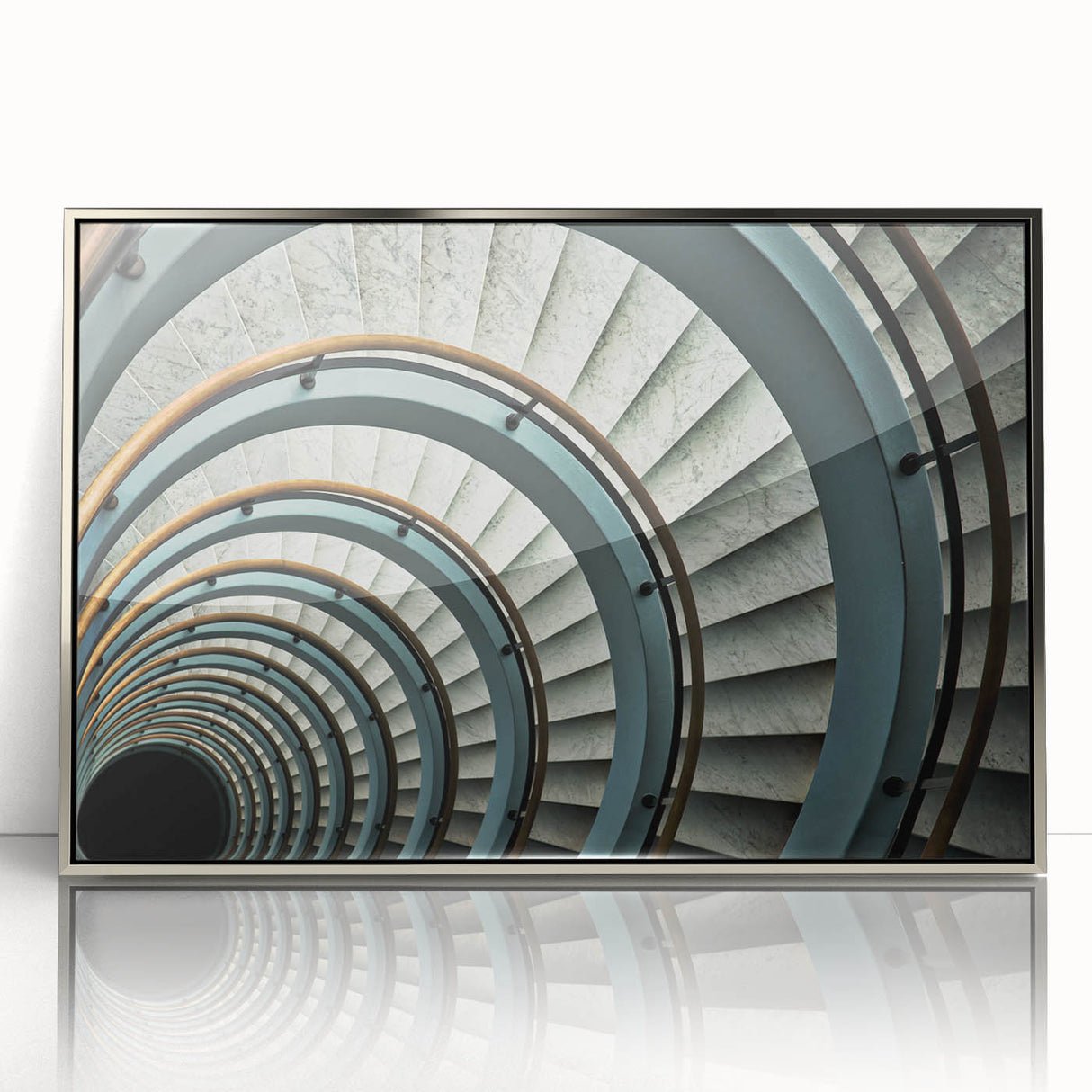Mid-century modernist art featuring a spiral staircase in muted gray tones, acrylic print framed in silver.