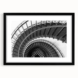 Abstract art print featuring a colorful, textured depiction of a spiral staircase on a large black-framed canvas.